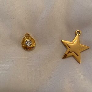 2 Coach charms